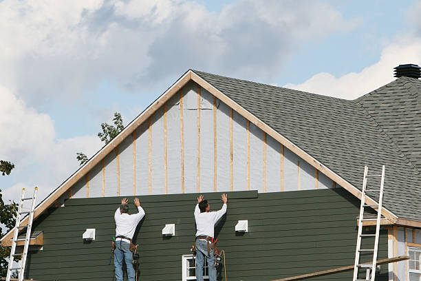Professional Siding Replacement technician working in Crownsville, MD